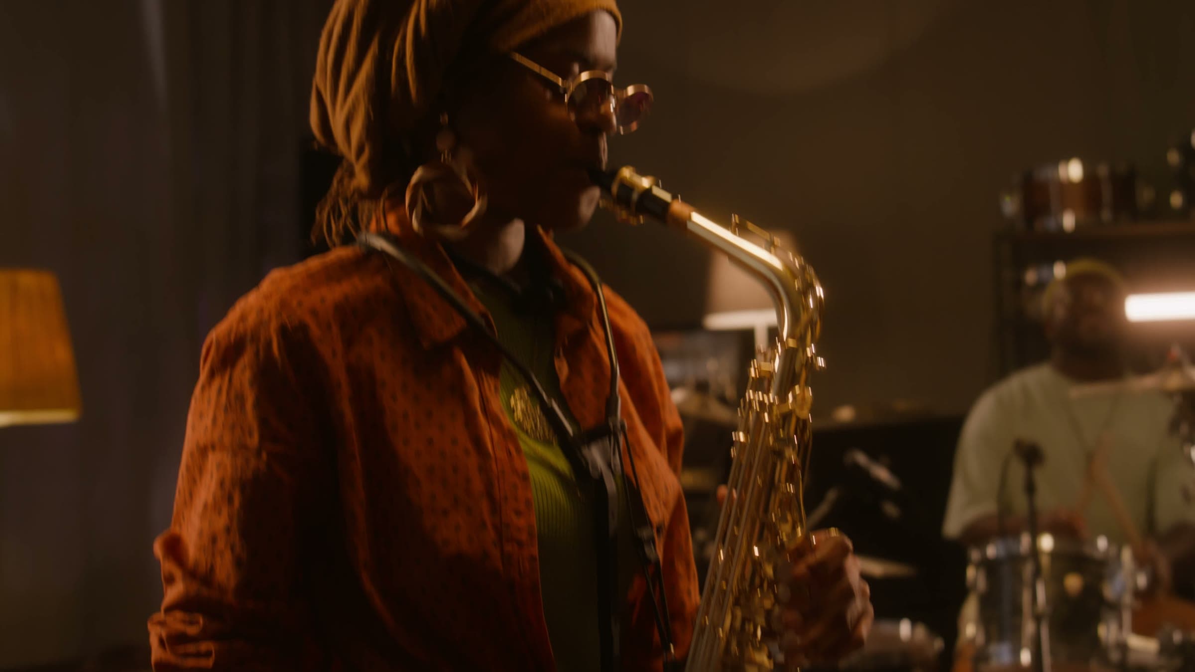 A saxophonist performing in a studio